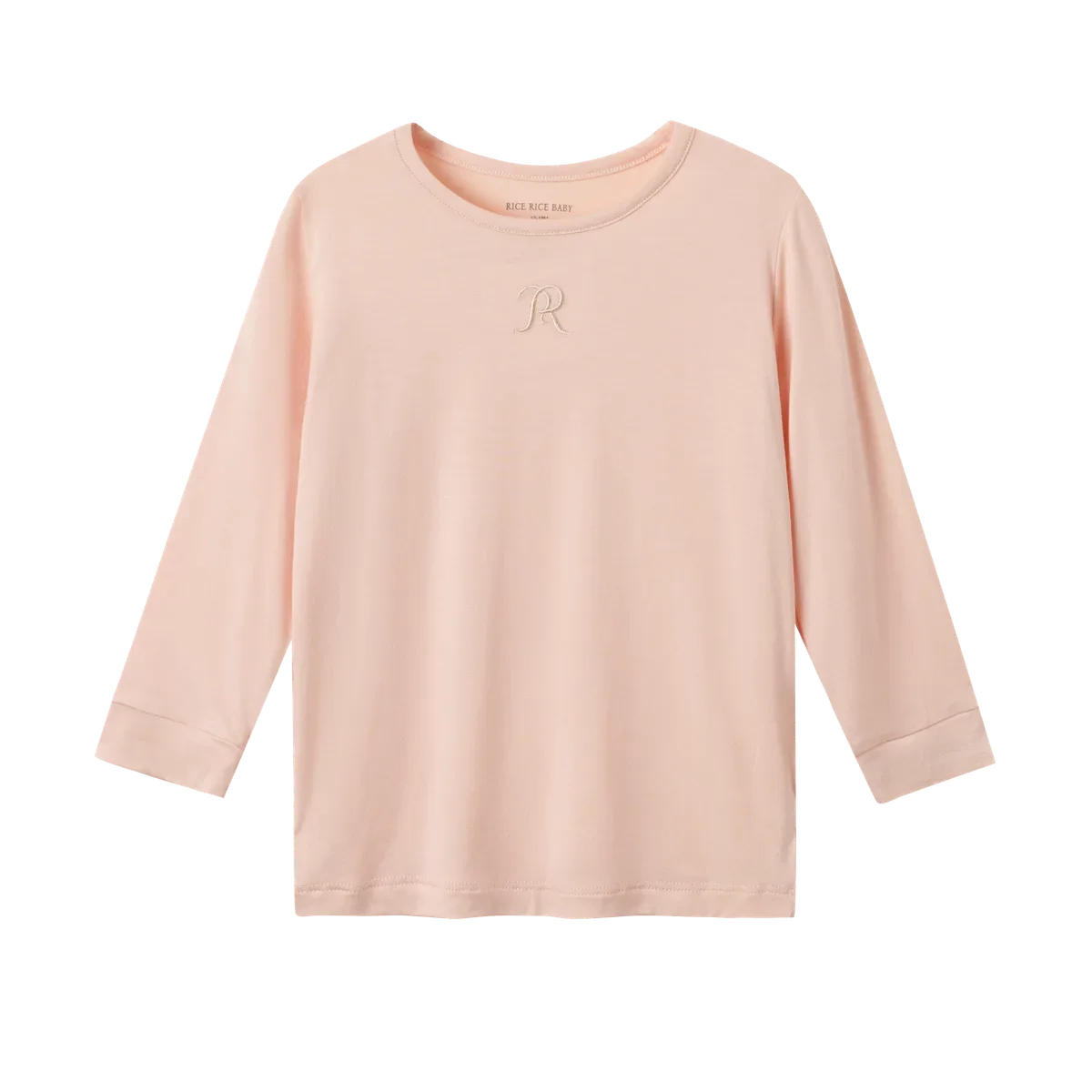 Front of the Champagne Blush bamboo viscose top showing plain fabric and embroidered R