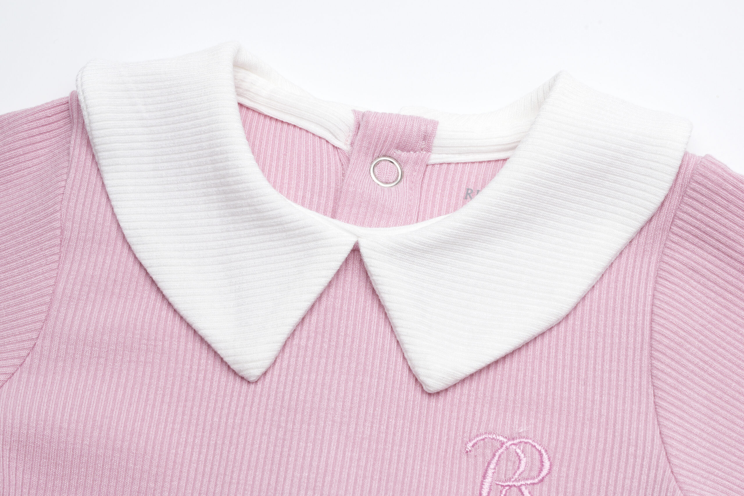 Classic long-sleeve collar baby romper in soft modal fabric collar detail.